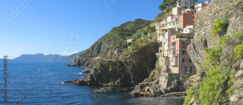 riomaggiore cliffs over the blue sea, the cinque terre, italia,