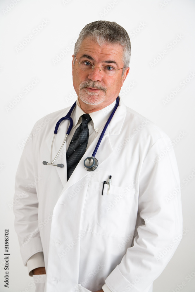 doctor with hand in pockets doubting patient doctor with hand in pockets doubting patient