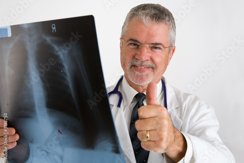 Wallpaper Mural doctor giving thumbs up after examining x-ray Torontodigital.ca
