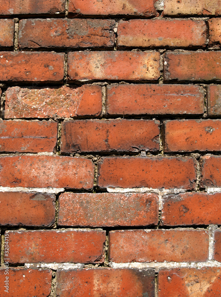 close up of an old weathered red brick wall. close up of an old weathered red brick wall.