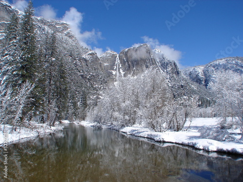 River, distant waterfall and mountain range in Yosemite