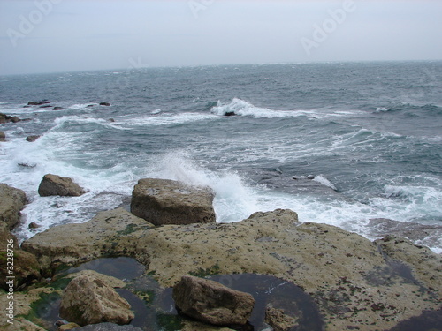 raging sea pounding the coast
