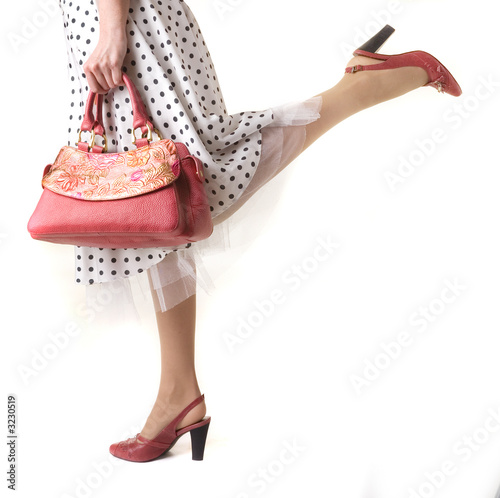 girl's legs with bag
