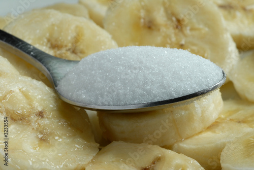 la cuillère de sucre en poudre
