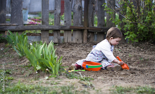 baby playing with dirt