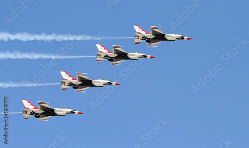 a fighter formation at an air show