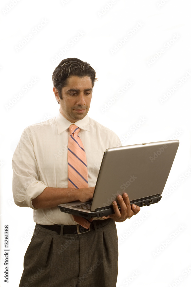 Young mddle-eastern businessman using laptop Young mddle-eastern businessman using laptop