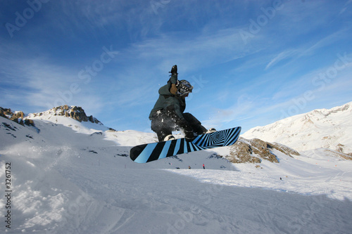 jumping snowboarder photo