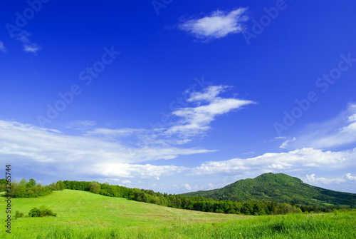 meadow with clouds.