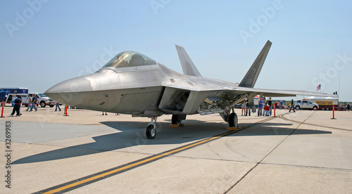the fighter f-22 displayed at an air show
