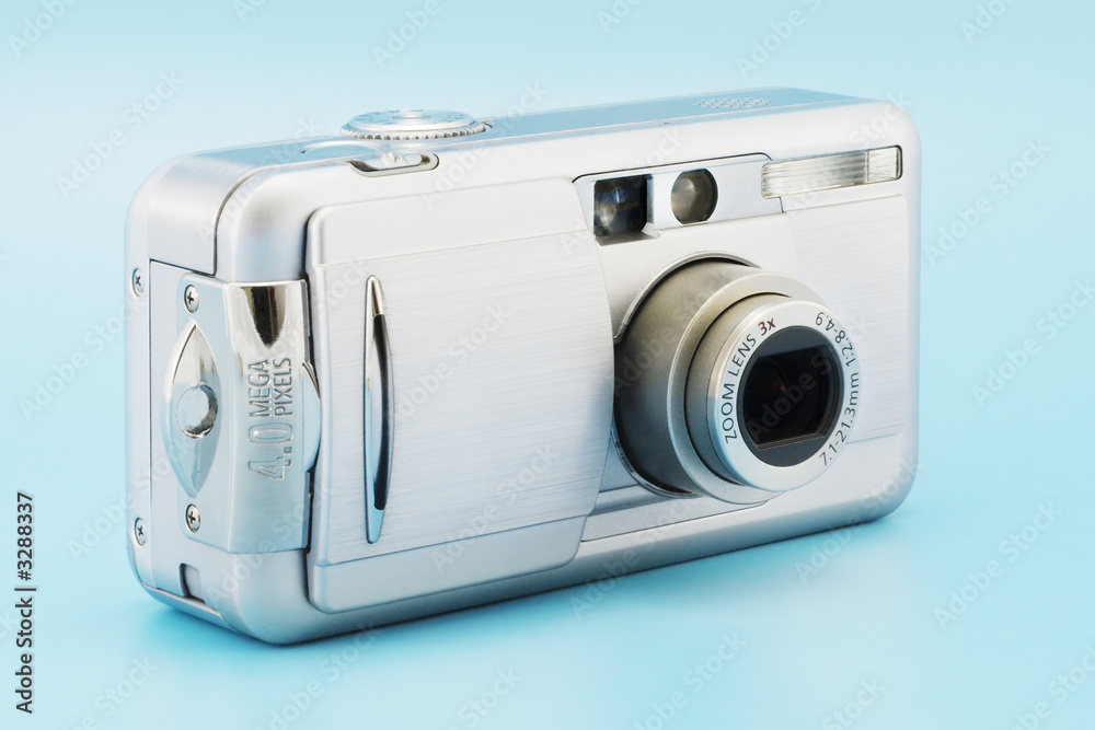 digital photo camera (isolated on blue) digital photo camera (isolated on blue)