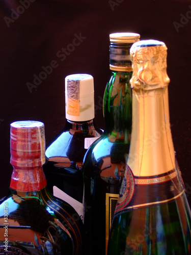 wine, whiskey, and champagne bottles