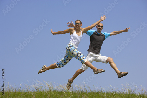 young couple jumping