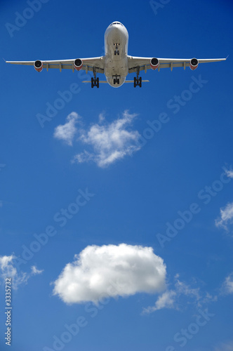 airliner and cloud