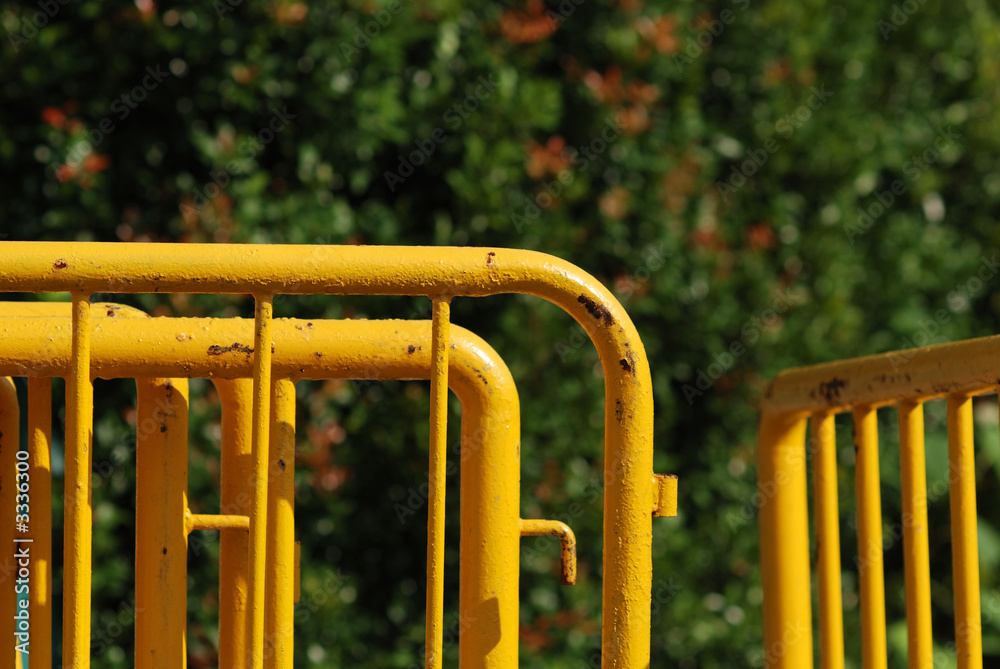 yellow fence and tree in the stadium yellow fence and tree in the stadium