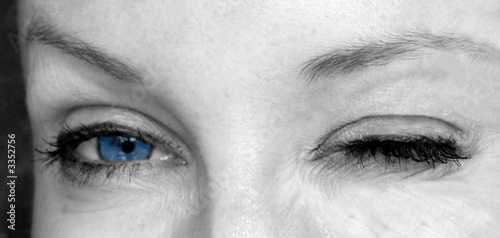young lady winking blue