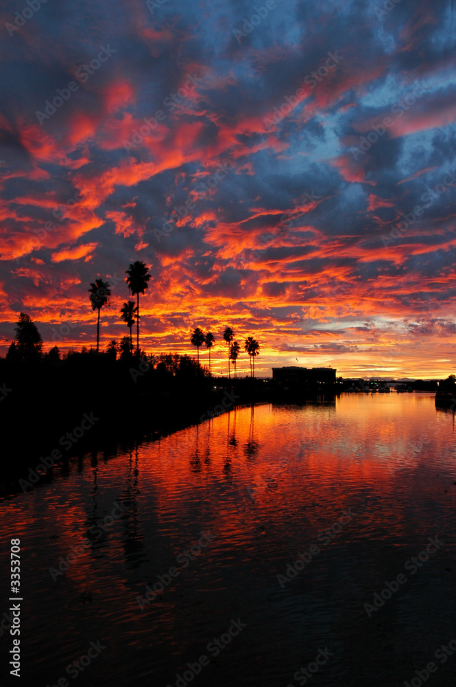 dramatic red sunset reflected  over california