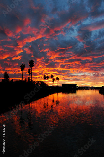 dramatic red sunset reflected over california