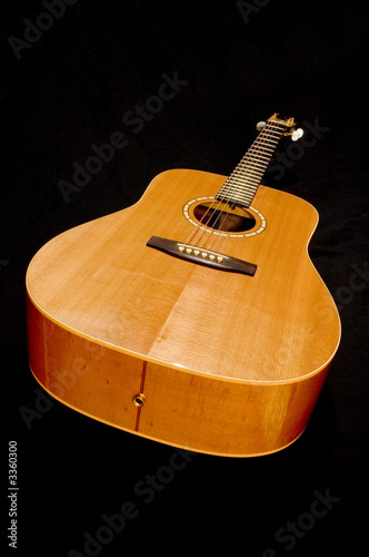 acoustic guitar on black