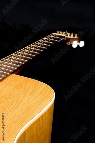 guitar neck on black