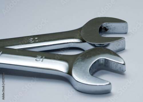 two open ended spanners or wrenches