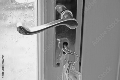 door handle, key and lock