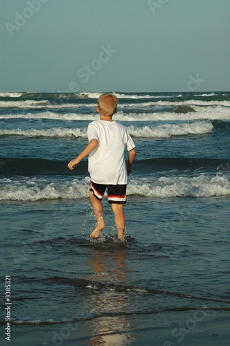 boy going in the ocean