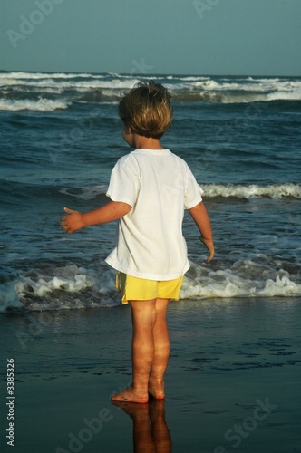 girl looking at the ocean