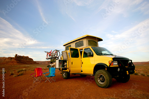 camping with yellow rv van