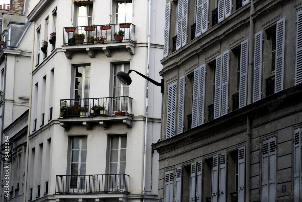 parisian apartments with street lamp