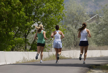 Sierkussen Joggen Drie vrienden samen op hardlooproute  © Chris Galbraith