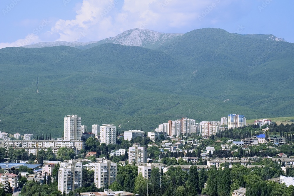modern city located in an environment of mountains
