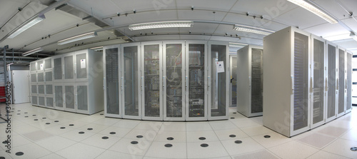 hosting cabinets passage rackmounts servers data center room with computers and storage systems