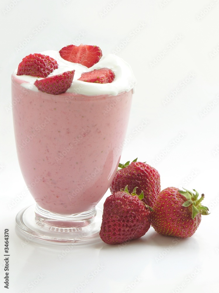 strawberries-youghurt coctail in a glass cup strawberries-youghurt coctail in a glass cup