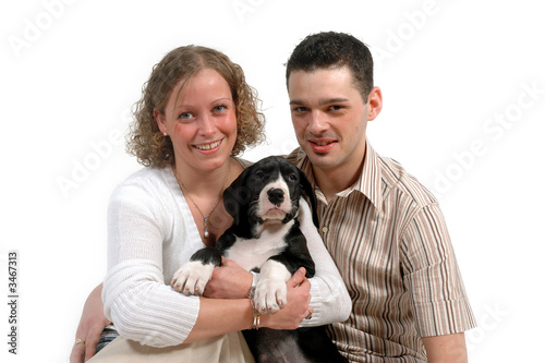 young couple and puppy