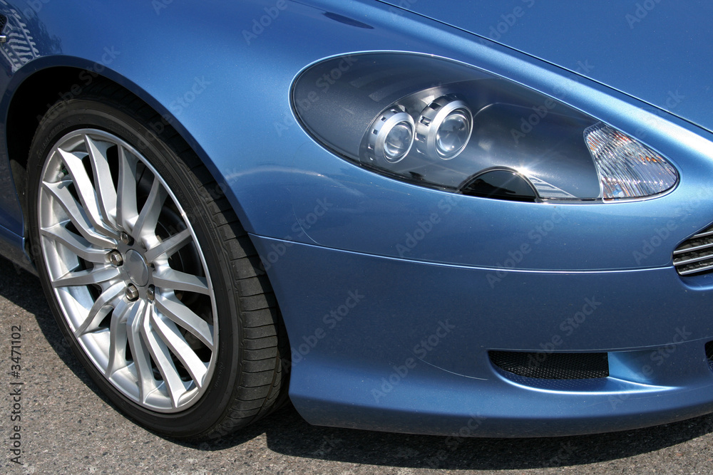 Fototapeta premium blue supercar headlight