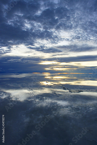 sunset over wet bolivian salt flats © SDuggan