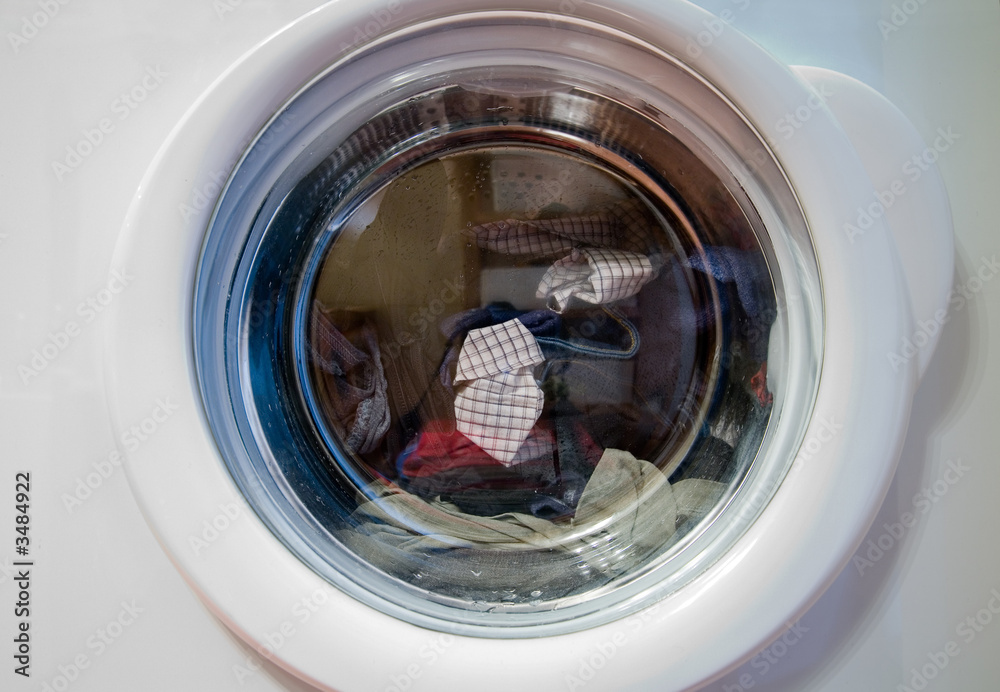 washing machine with loundry inside washing machine with loundry inside
