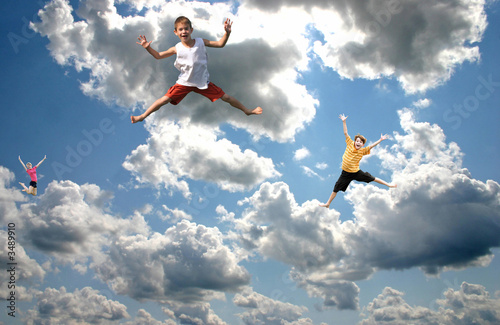 kids jumping in the sky