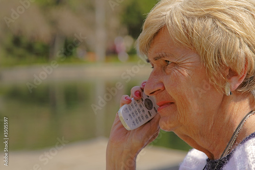 senior woman with phone