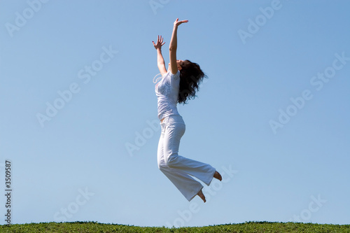 happy young woman is jumping © Dmytro Sunagatov