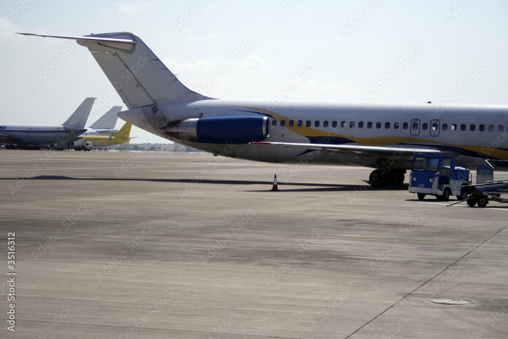 airplanes on a runway airplanes on a runway