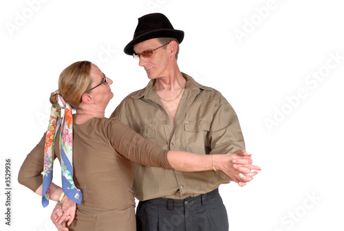 middle aged couple dancing