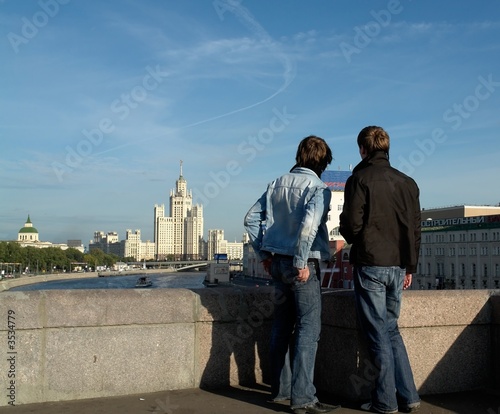 Two boys from the bridge view the Moscow sights