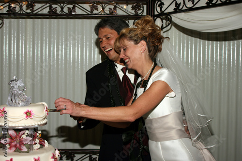 Bridal Couple Cutting Cake