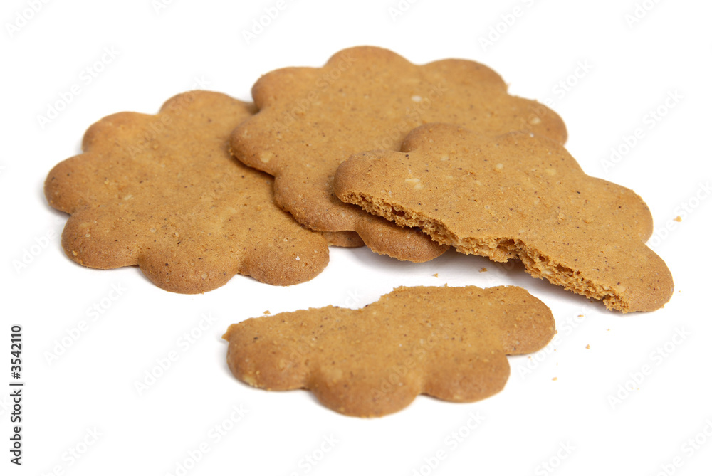 three cookies and one broken cookie over white three cookies and one broken cookie over white