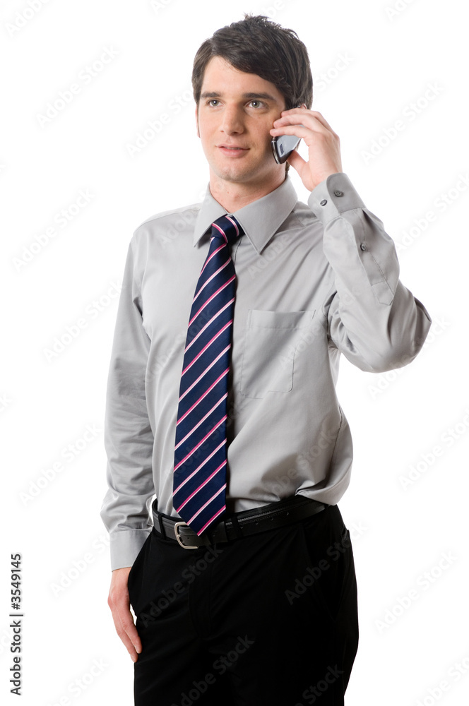 A young businessman in shirt and tie on white background A young businessman in shirt and tie on white background