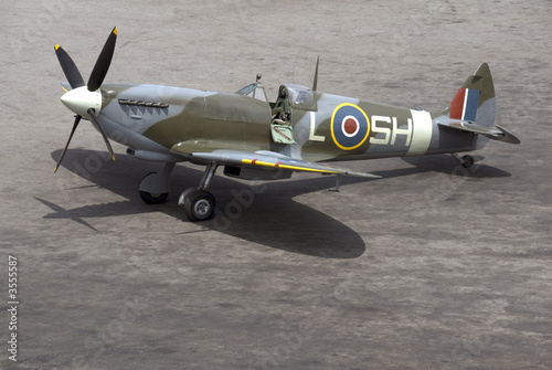 A British Spitfire fighter plane stands ready for action.