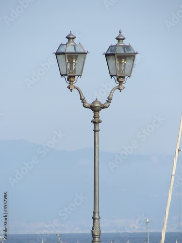 Street lamp on blue sky