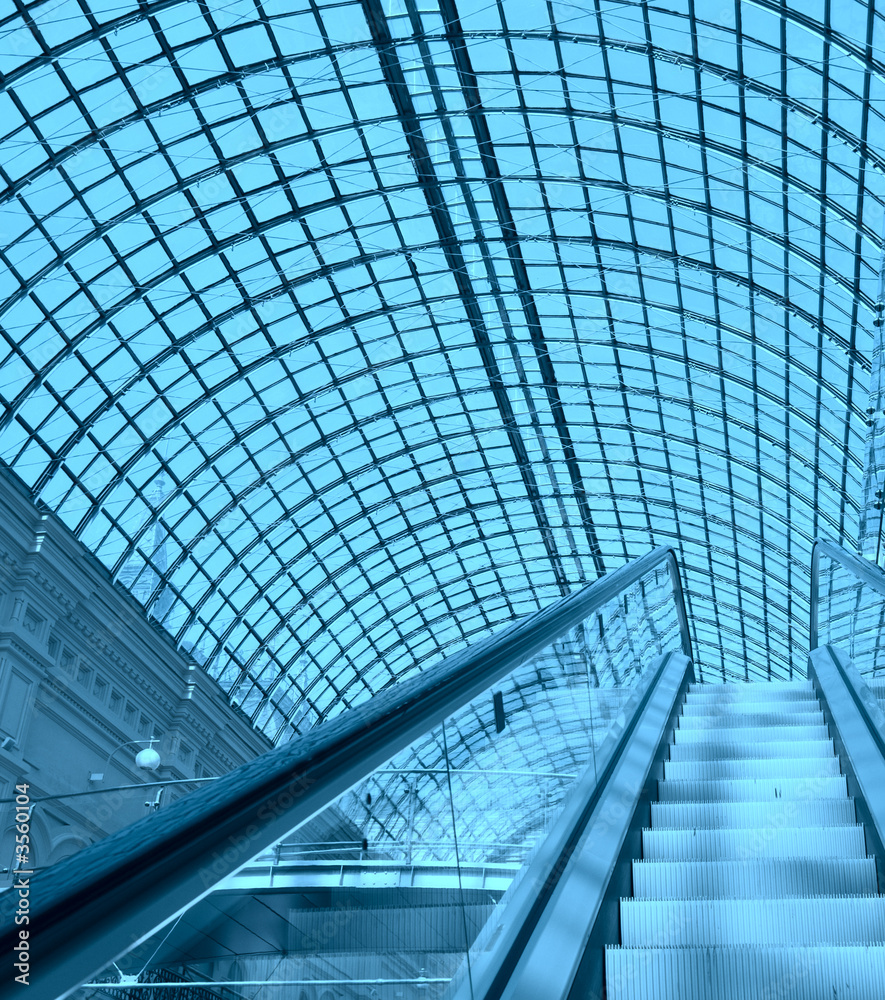 escalator in a shopping mall escalator in a shopping mall